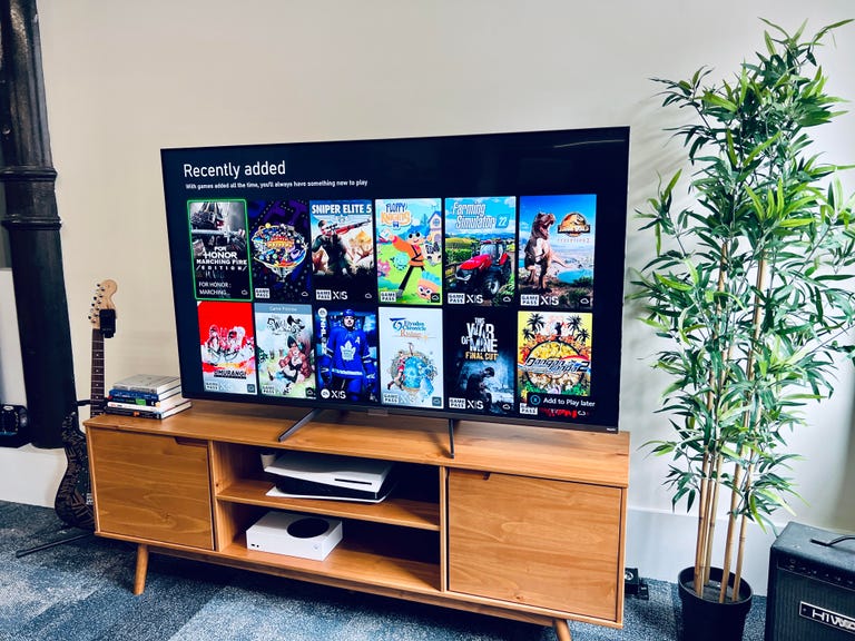 A TV showing the Xbox Game Pass menu.