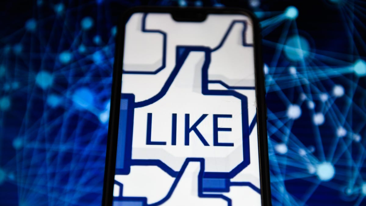Facebook like logo is seen on an android mobile phone
