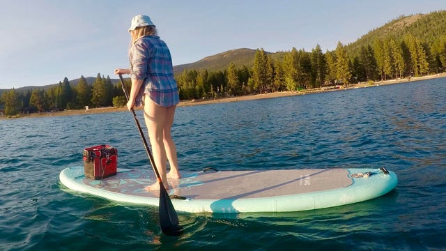 Aqua marina paddle board in the water