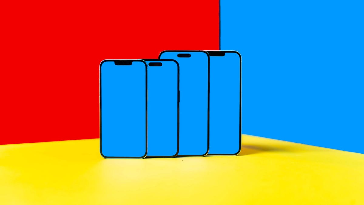 iPhone 14, iPhone 14 Pro, iPhone 14 Pro Max and iPhone Plus with blue screens against a red, yellow and blue background