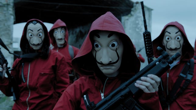 Bank robbers Money Heist change into red overalls and masks that look like the painter Dali.