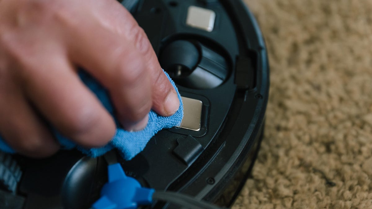 cleaning the charging contacts on a robot vac