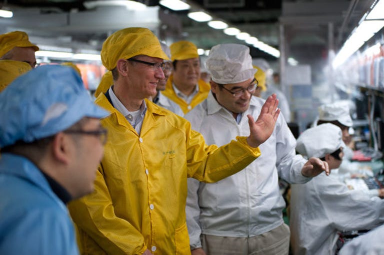 Apple CEO Tim Cook visits Foxconn's Zhengzhou factory line.
