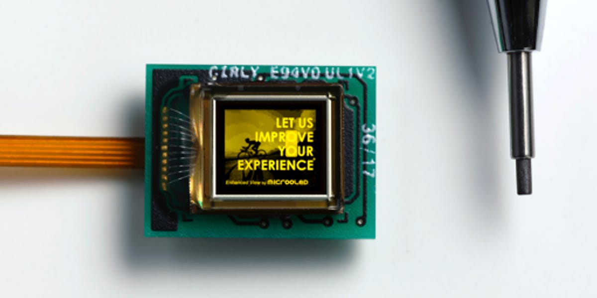 A tiny monochrome Micro-OLED display next to the tip of a mechanical pencil.