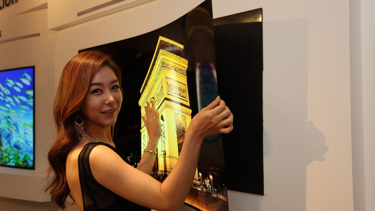 LG Display shows off press-on 'wallpaper' TV under 1mm thick - CNET