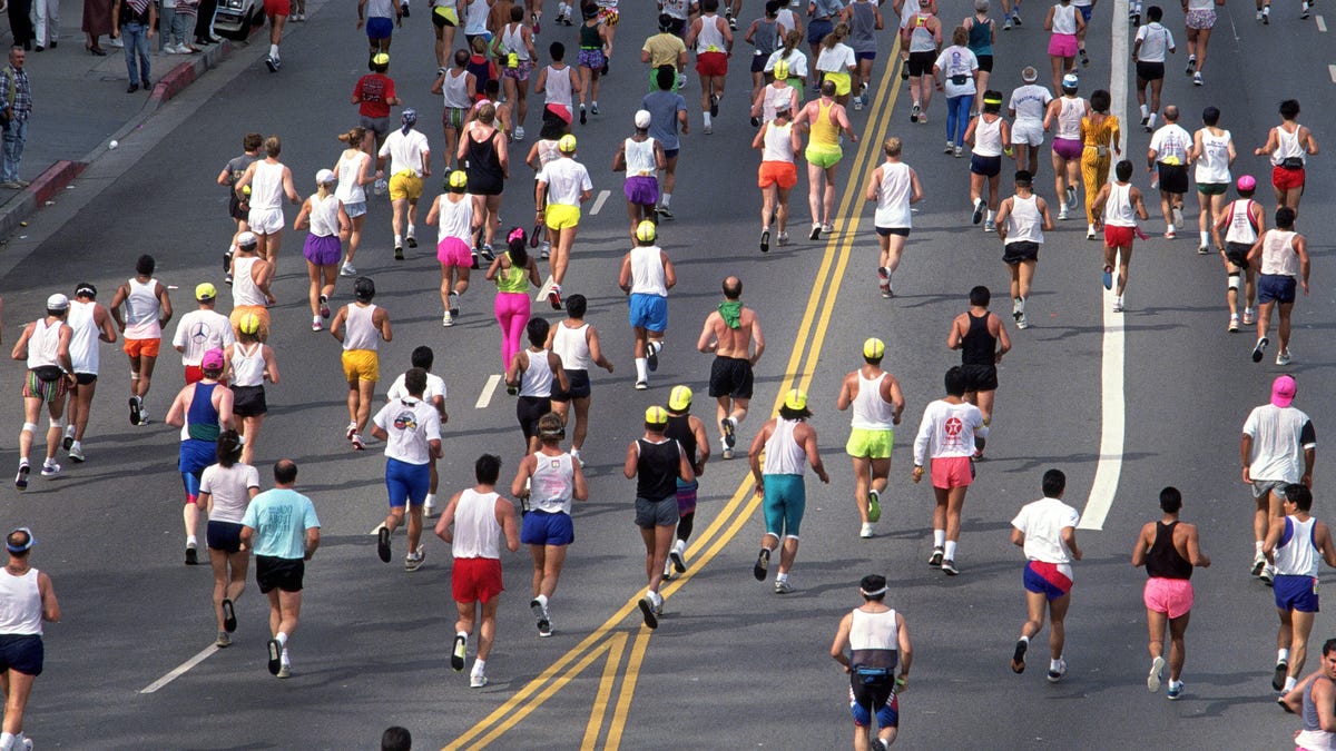 runners on a city street during race
