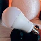 Wiz smart light bulb on a table