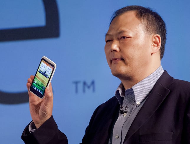 HTC Chief Executive Peter Chou holds the new HTC One X Android phone at Mobile World Congress in Barcelona, Spain.