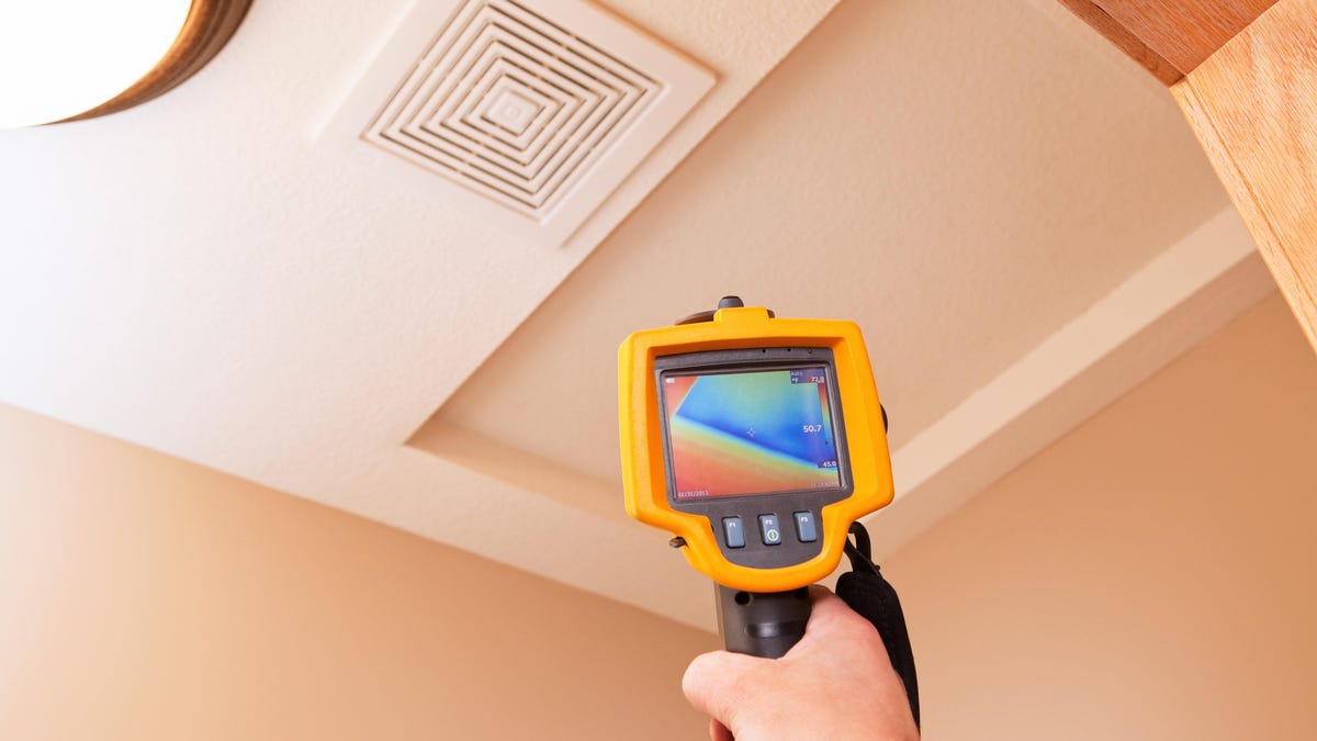 Infrared Thermal Imaging Camera Pointing to Attic Access