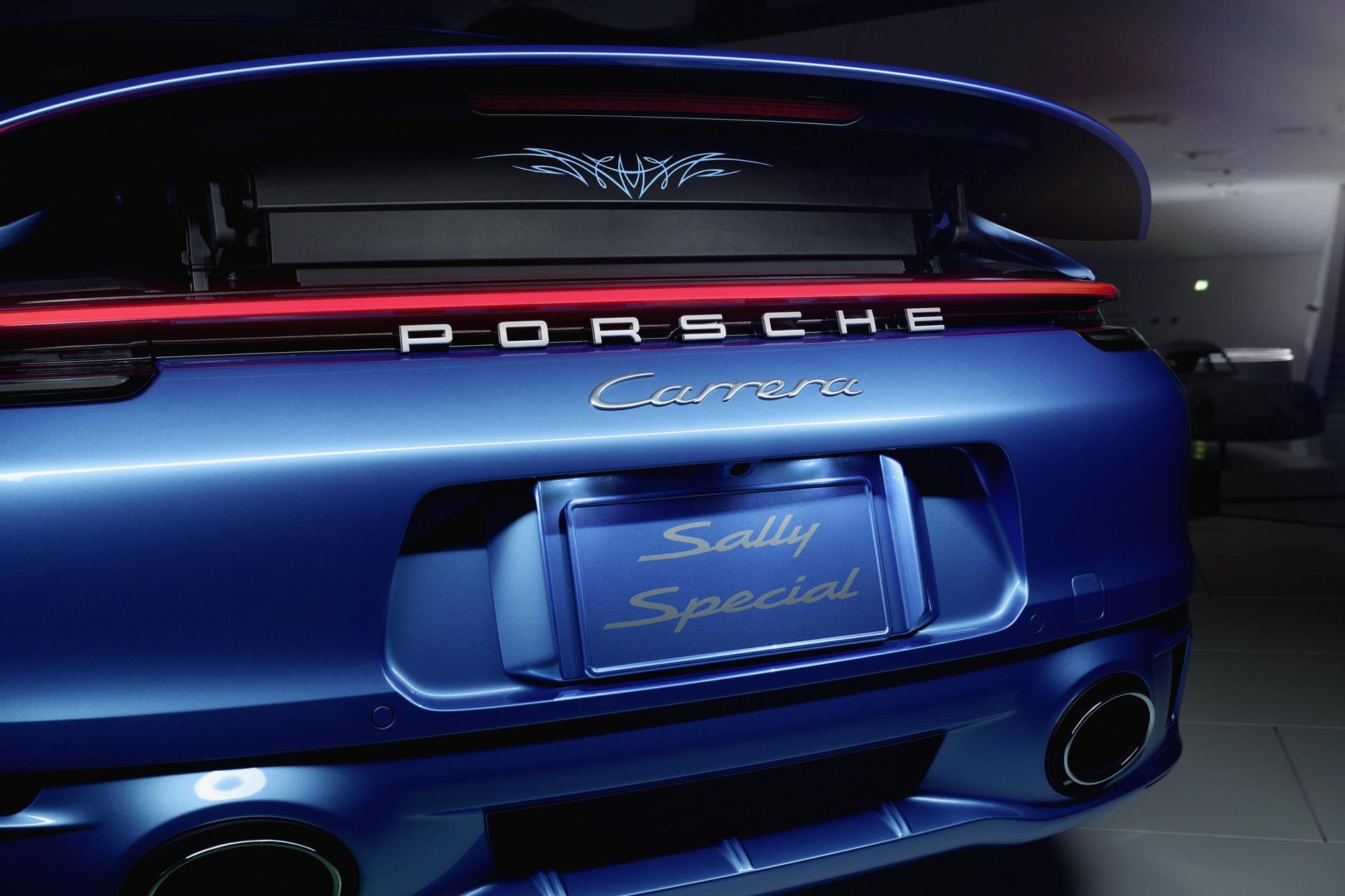 Close-up view of the Porsche 911 Sally Special's spoiler up.