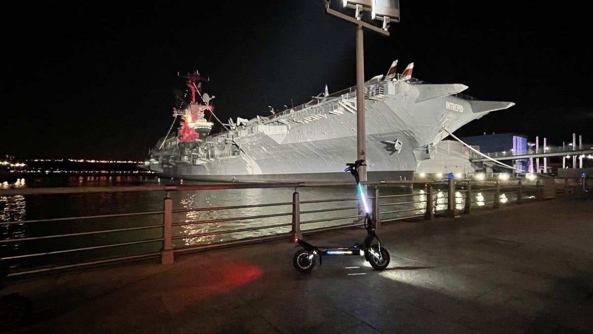 A Dualtron Storm electric scooter in front of the Intrepid Sea, Air & Space Museum
