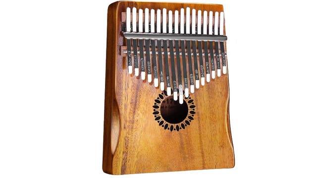 A wooden kalimba with steel notes