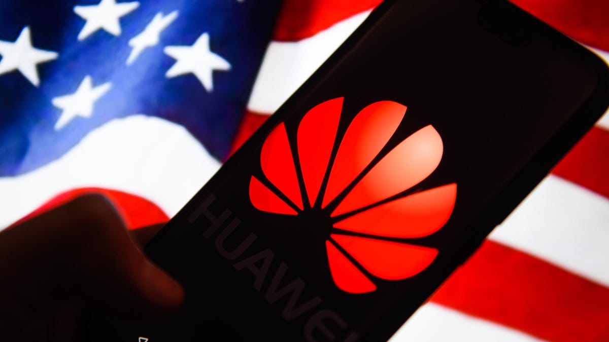 Huawei  logo is seen on an android mobile phone with United