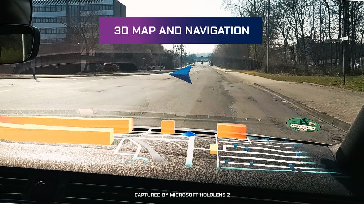 A heads-up display in a moving car, showing a 3D map and navigation on Microsoft's HoloLens 2