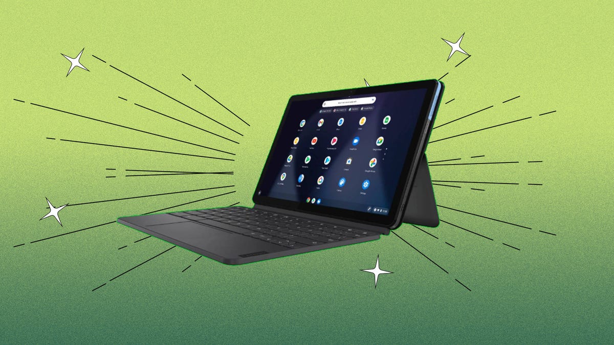 An open Lenovo Duet Chromebook against a green background.
