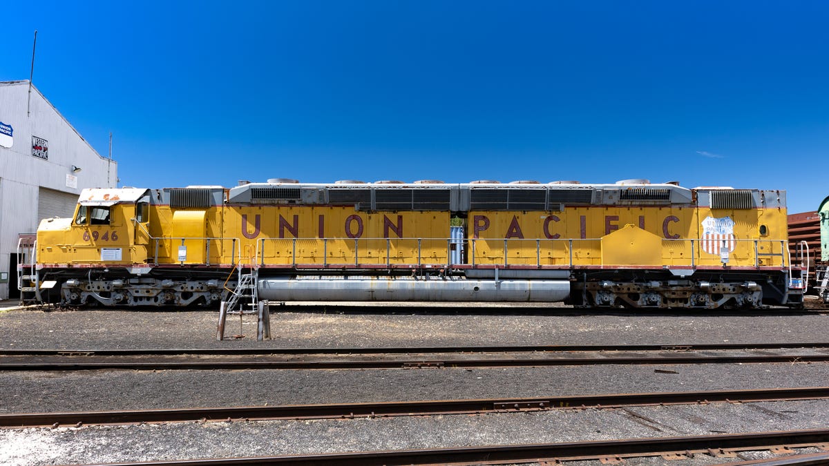A side view of an EMD DD40X locomotive in Union Pacific livery.