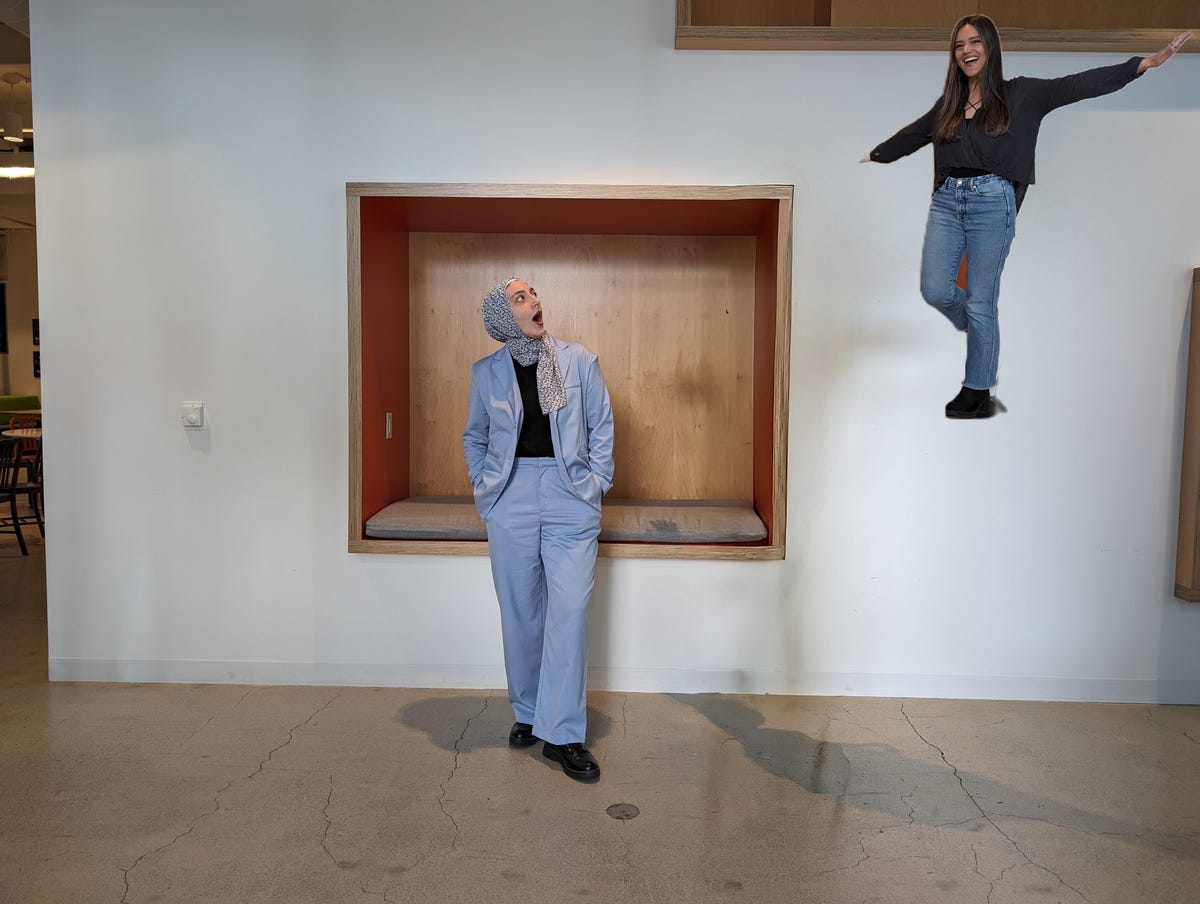 A woman looking at another woman floating