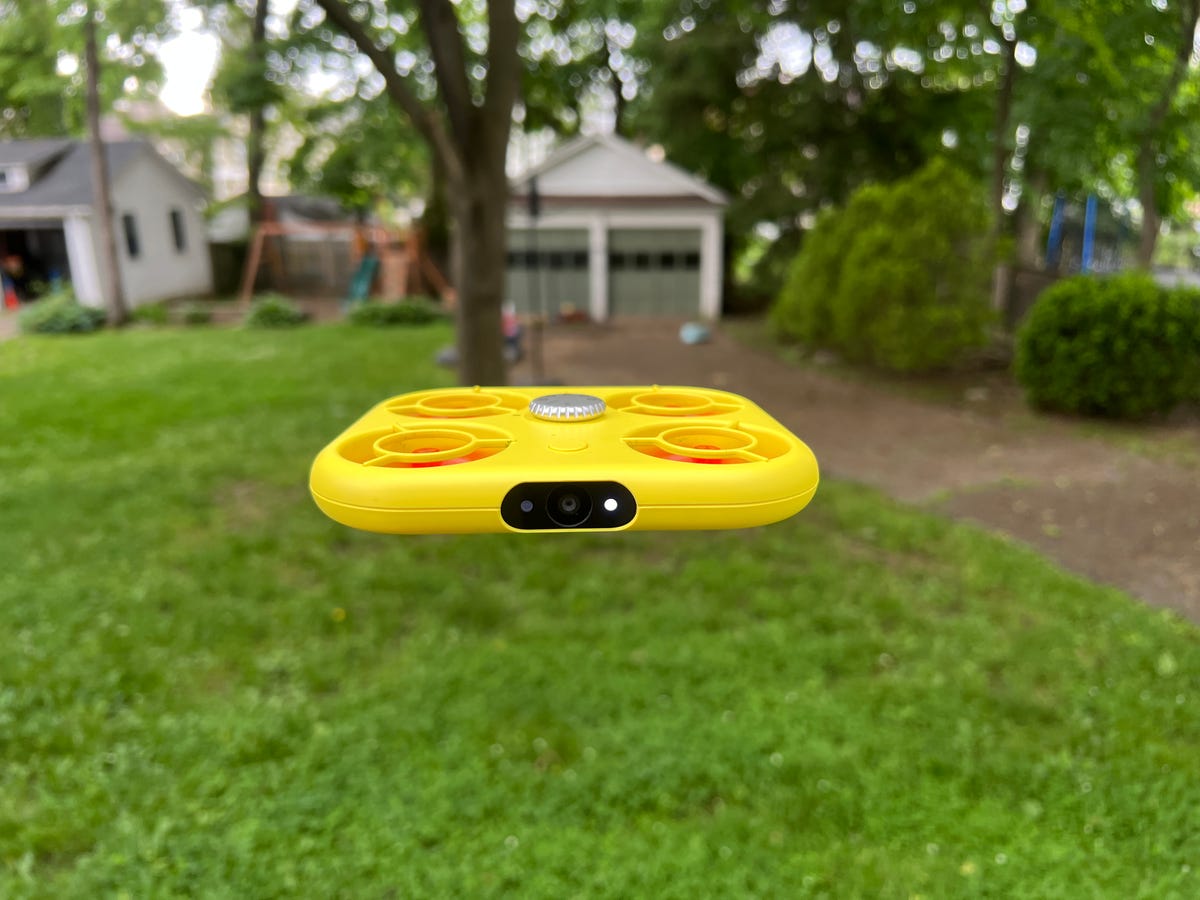 The Snap Pixy flying in a big yard