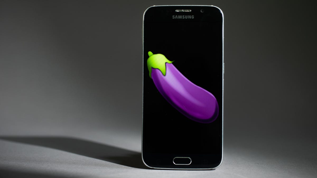 A picture of a Samsung phone displaying the eggplant emoji