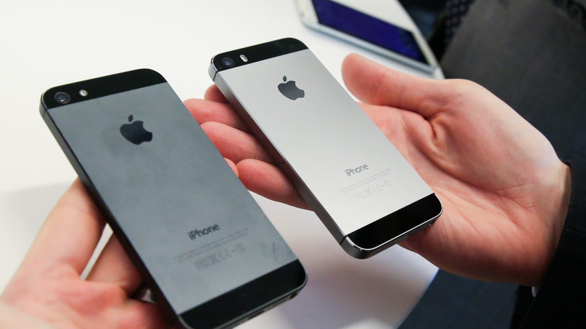 The iPhone 5, left, and 5S in space gray.