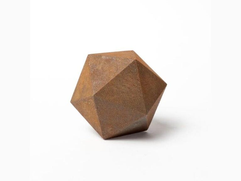 A rusted iron docahedron