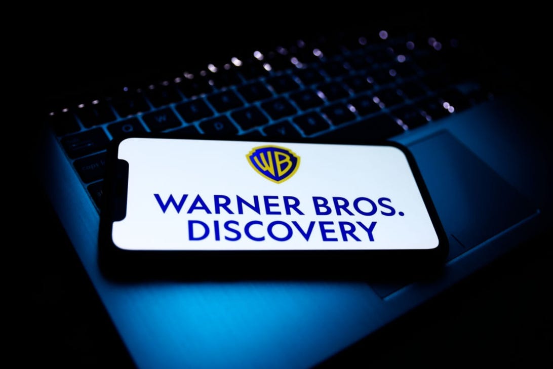 Warner Bros.  Discovery logo on a smartphone screen