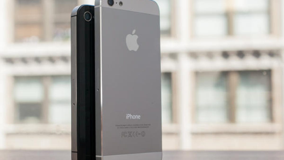 The iPhone 4S (left) next to the iPhone 5.