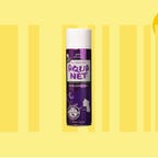 A can of Aqua Net with a yellow background