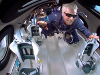 <p>Richard Branson floats in microgravity during the Virgin Galactic flight on July 11 above New Mexico. </p>