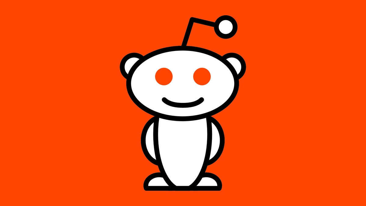 Reddit's "Snoo" logo, a smiling alien with one antenna and circular features, in front of a red background.