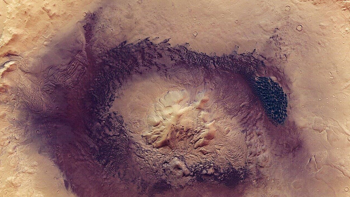 the-dark-dunes-of-moreux-crater-pillars