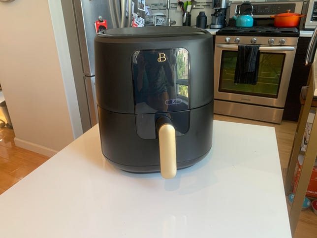 The Beautiful Air Fryer on a table