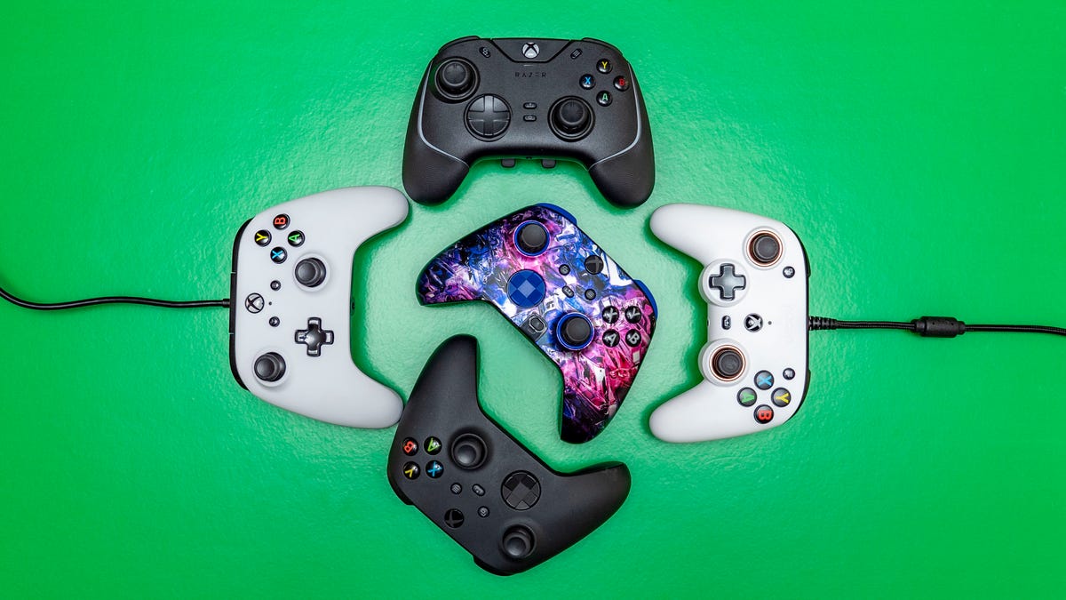 Five Xbox controllers, seen from above