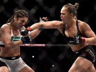 RIO DE JANEIRO, BRAZIL - AUGUST 01:  Ronda Rousey of the United States punches Bethe Correia of Brazil in their bantamweight title fight during the UFC 190 Rousey v Correia at HSBC Arena on August 1, 2015 in Rio de Janeiro, Brazil.  (Photo by Buda Mendes/Zuffa LLC/Zuffa LLC via Getty Images)