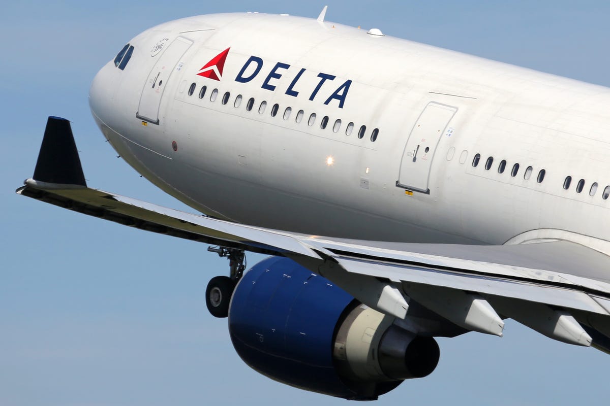 An airplane with a Delta logo on it