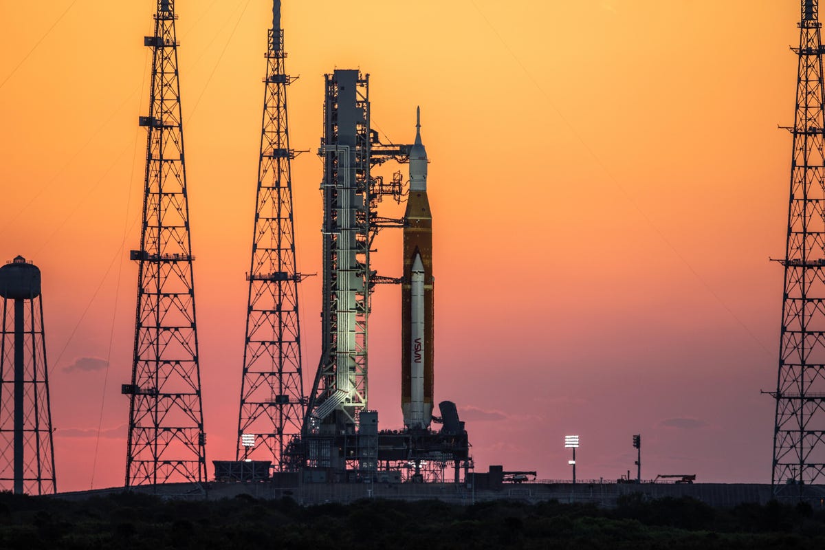 The Sun rises when the Artemis 1 rocket sits on the launch pad of NASA's Kennedy Space Center in Florida.