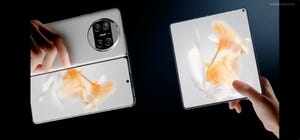 Huawei's New Folding Phone Is Thinner Than an iPhone 14 Pro Max     - CNET