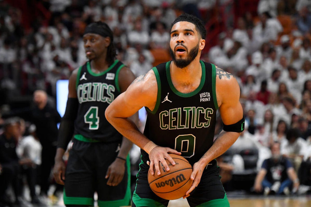Jayson Tatum #0 of the Boston Celtics shoots a free throw during the game against the Miami Heat during Round 1 Game 3 of the 2024 NBA Playoffs