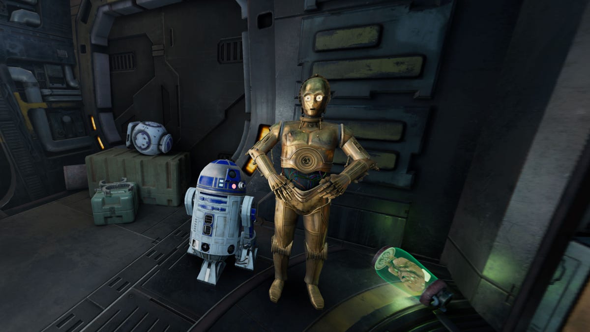 C-3PO and R2-D2 standing next to each other in a video game screenshot
