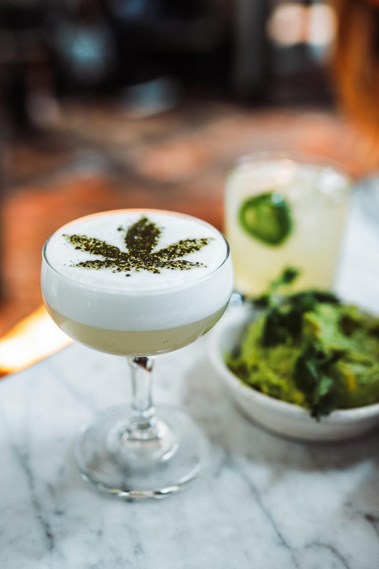 drink decorated with a marijuana leaf