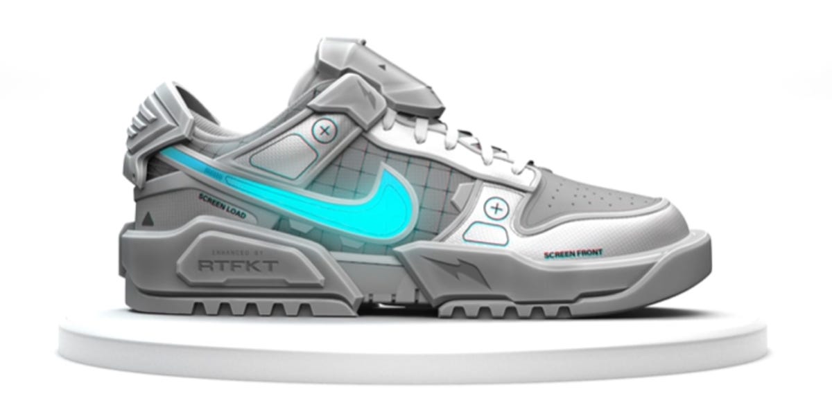 A white and gray Cryptokick sneaker with the Nike swoosh in a glowing blue.