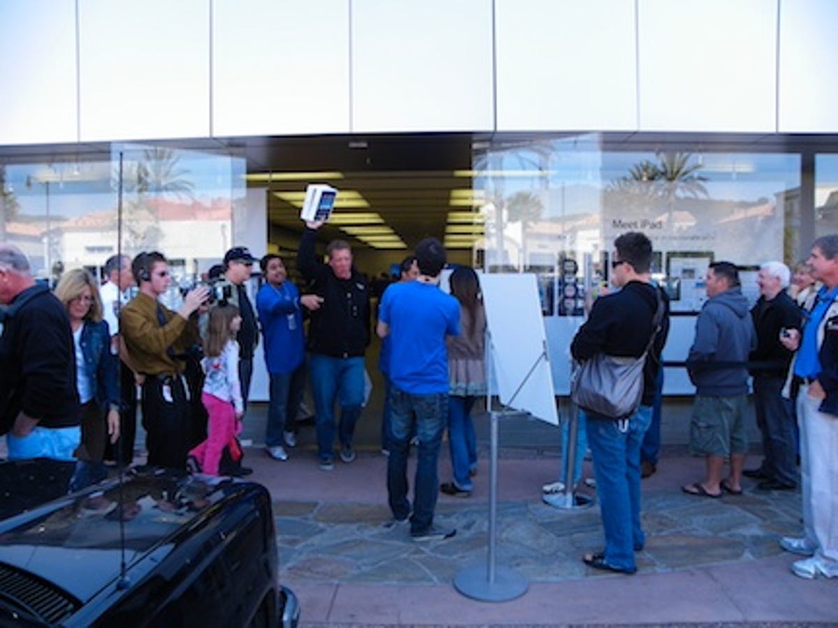 Customers emerging from the Apple Store in Carlsbad, Calif. spoke about why they purchased the iPad.
