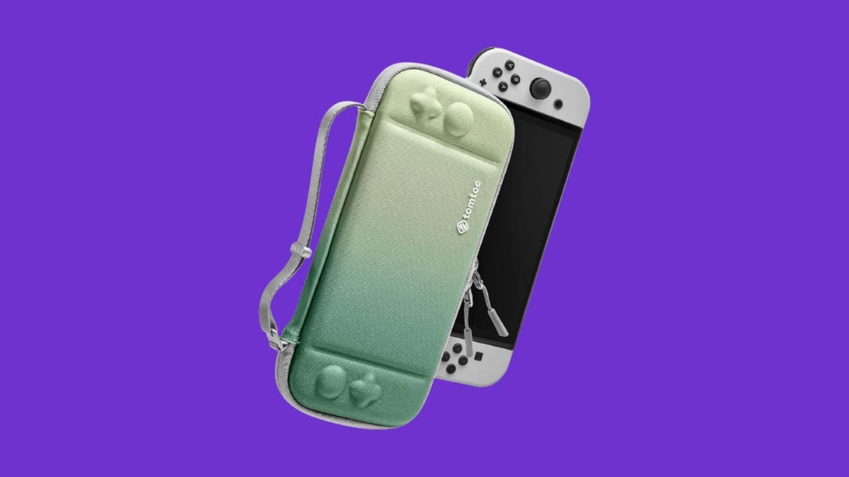 matcha green tomtoc nintendo switch case, in front of a white OLED switch on a purple background