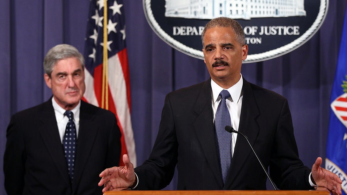 The Department of Justice has asked a Manhattan judge to grant its "petition to enforce" a warrantless legal demand the FBI sent Google. FBI director Robert Mueller and attorney general Eric Holder, right, in this file photograph.