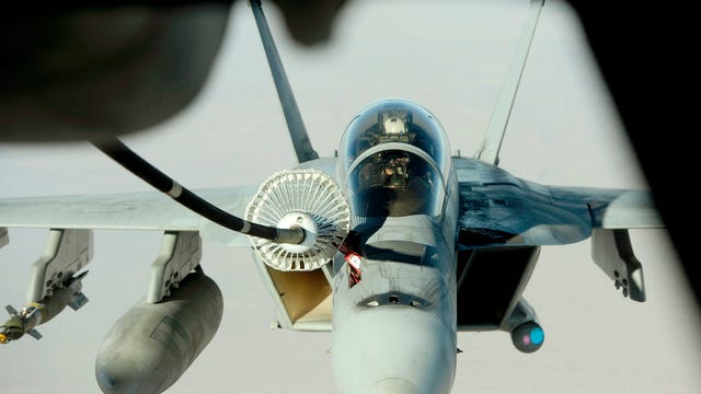 FA-18_Hornet_gets_into_position.jpg
