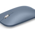 blue-gray Microsoft Surface Mobile mouse on a white background