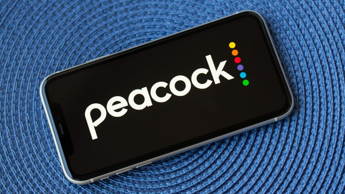 Peacock logo on an iPhone screen