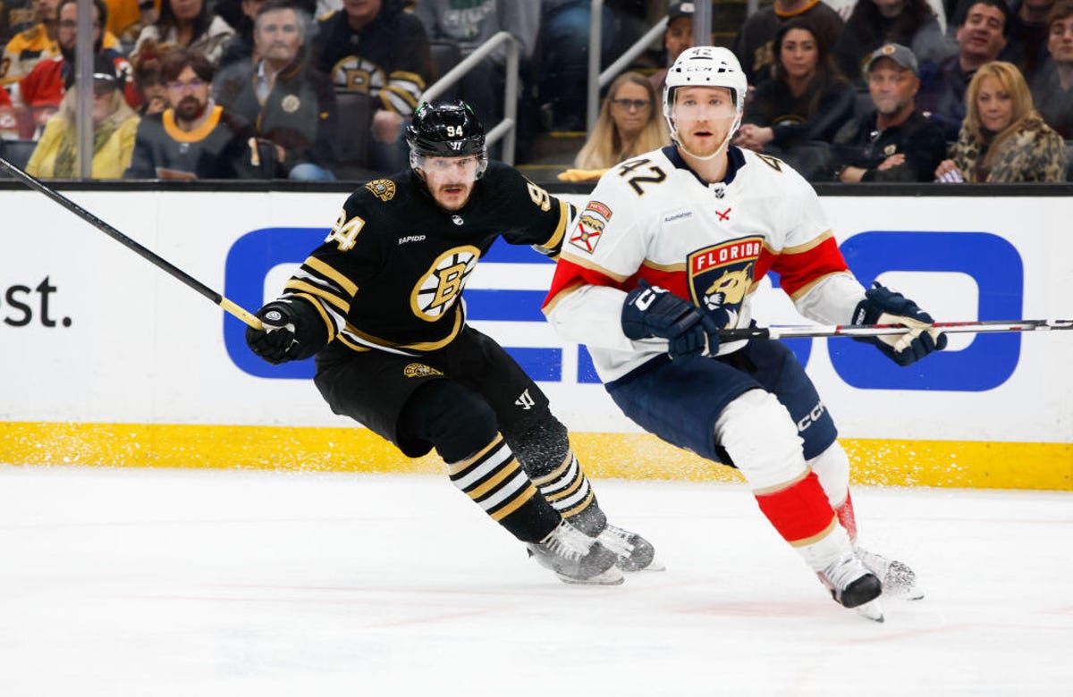 Jakub Lauko #94 of the Boston Bruins pursues Gustav Forsling #42 of the Florida Panthers during the third period in Game Four of the Second Round of the 2024 Stanley Cup Playoffs
