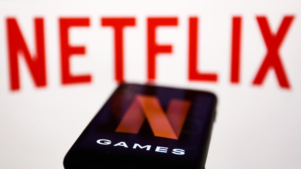 A smartphone with the Netflix Games logo in front of the words Netflix
