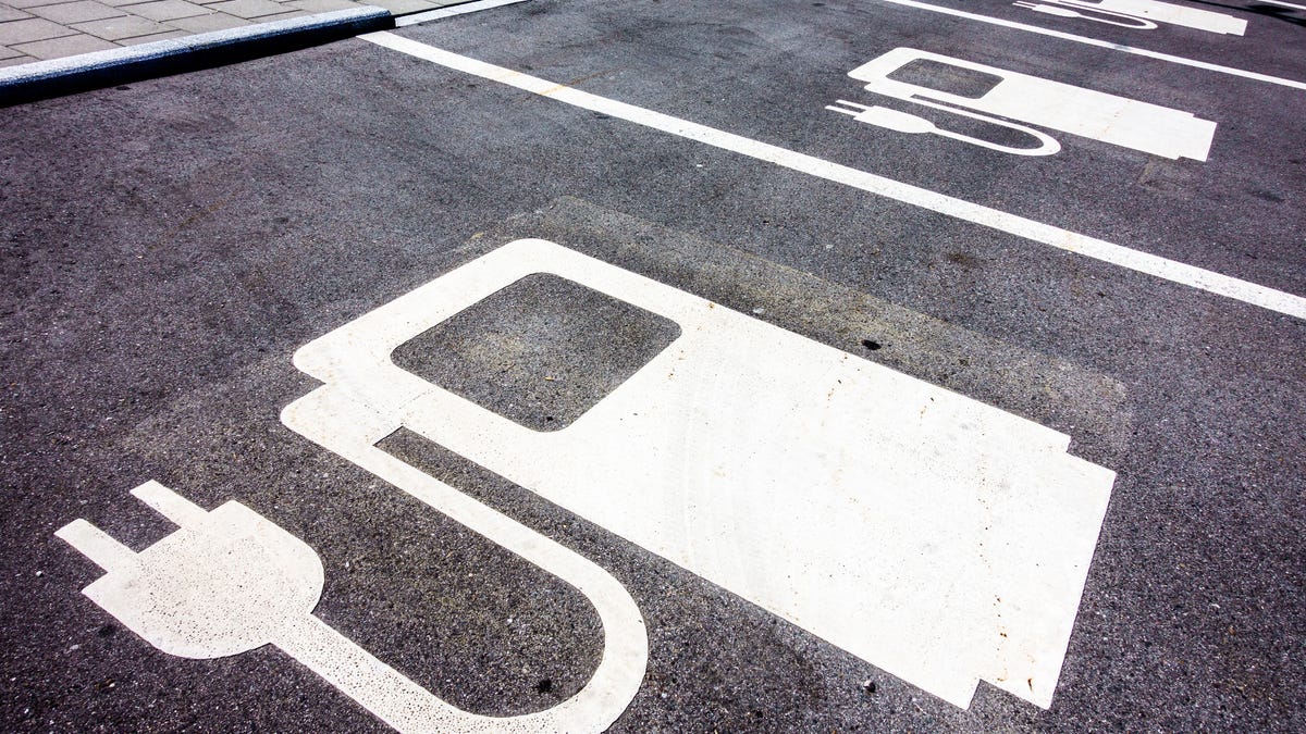 Icons for EV chargers in a row of parking spots